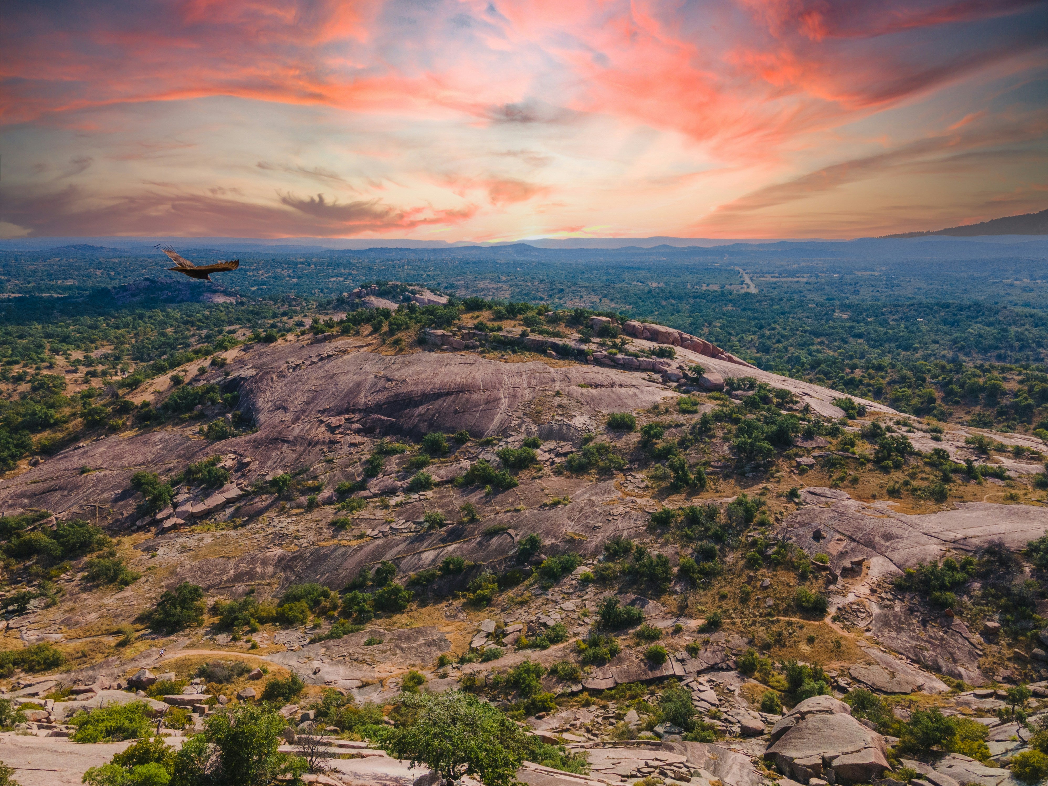 Aerial view of rocky hill landscape at sunset - Rocte Coffee Company